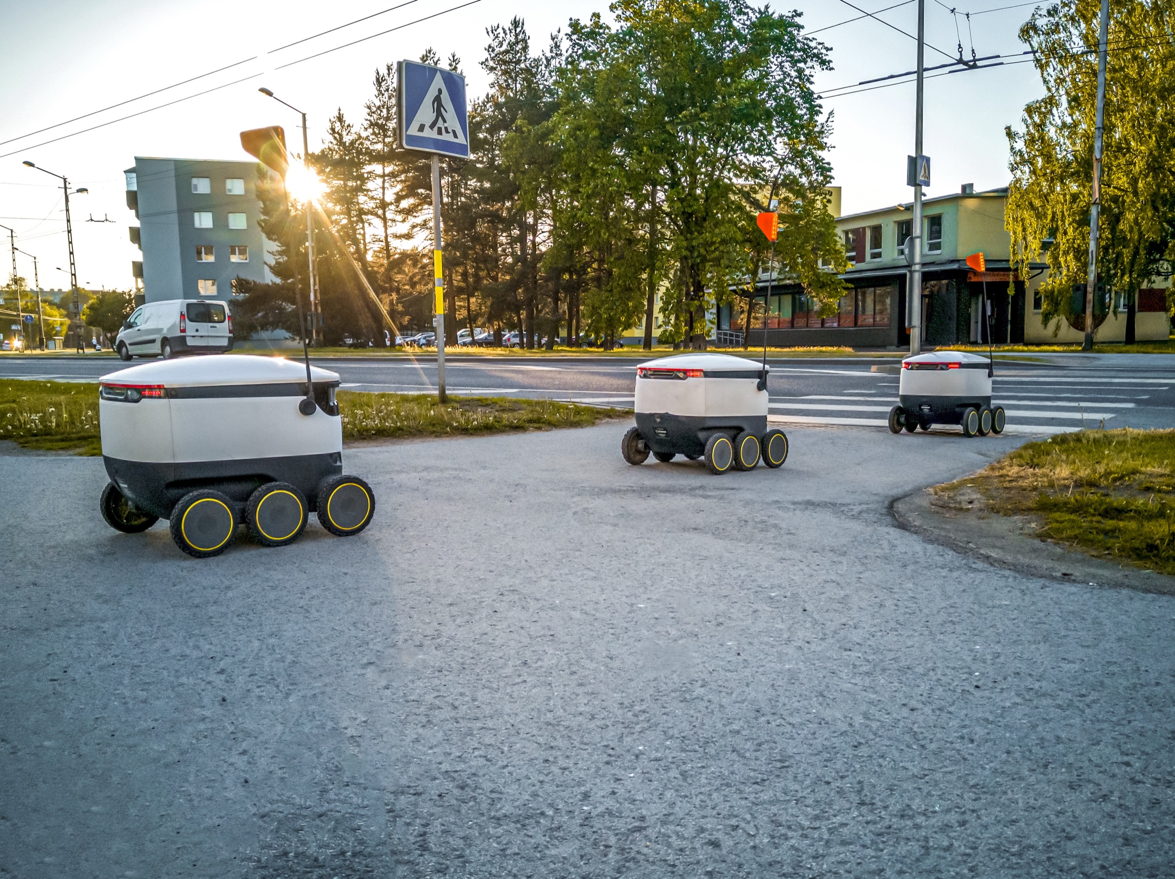 Sidewalk delivery robots crossing an intersection