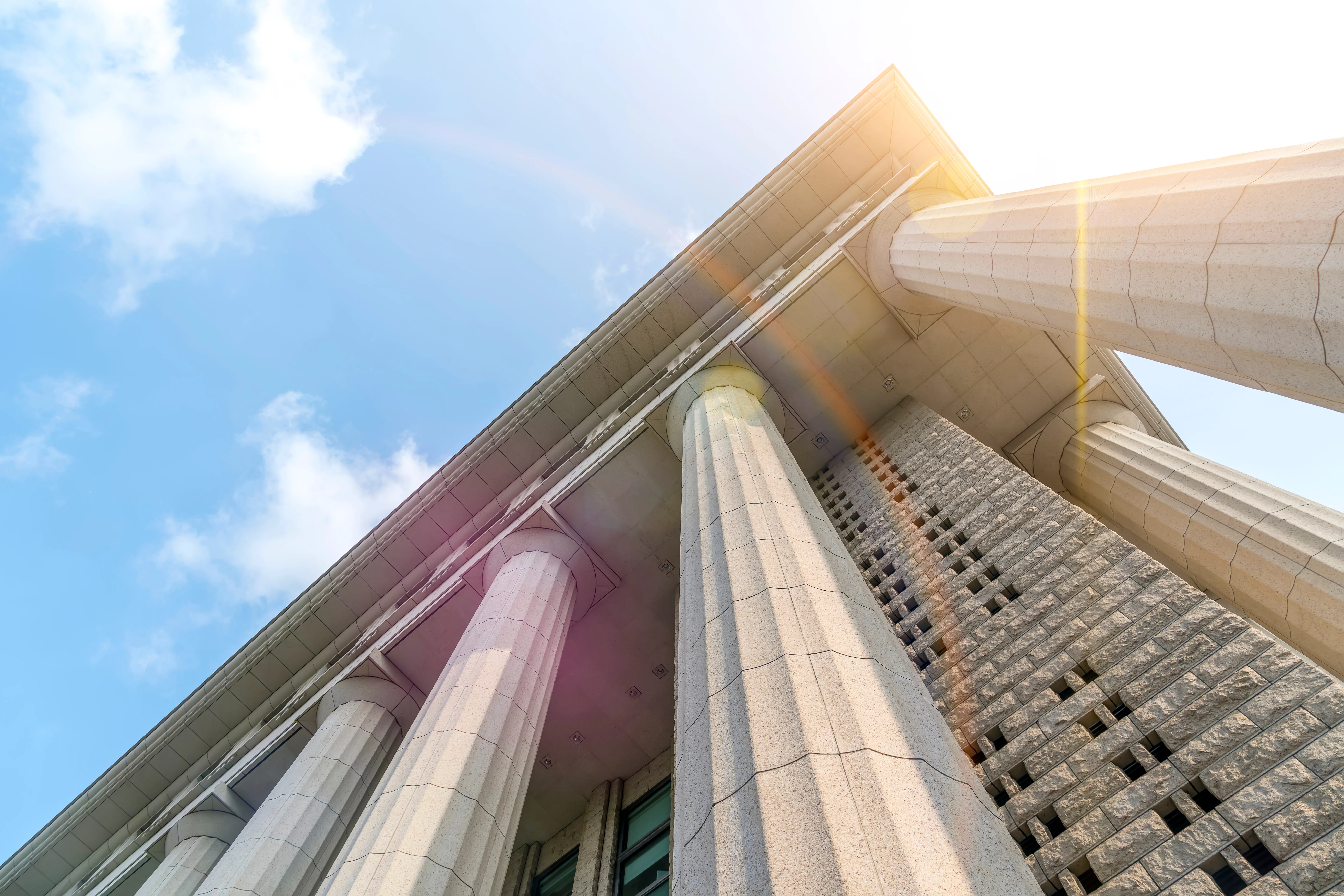Courthouse columns, looking upward toward sky